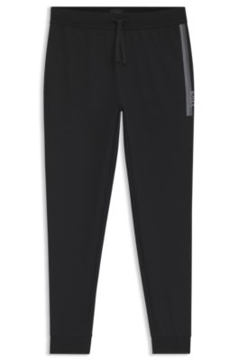 Cotton-terry tracksuit bottoms with stripes and logo, Black