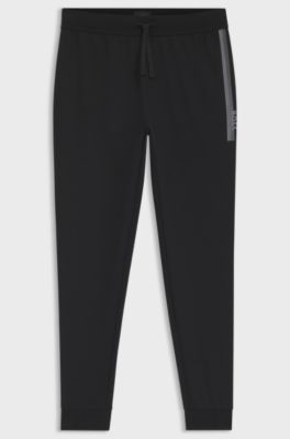 Cotton-terry tracksuit bottoms with logo and stripe, Black