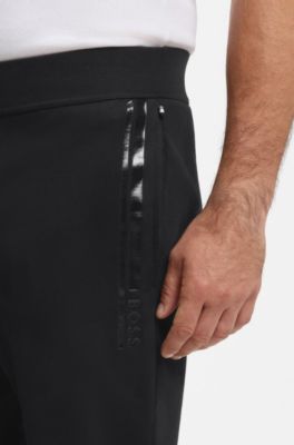 Cotton-terry tracksuit bottoms with logo and stripe, Black