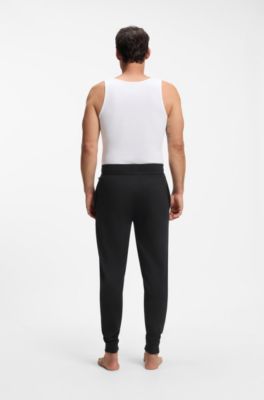 Cotton-terry tracksuit bottoms with logo and stripe, Black