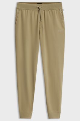 Pantaloni della tuta in terry di cotone con riga e logo, Beige