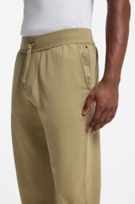 Trainingsbroek van katoenen badstof met logo en streep, Beige