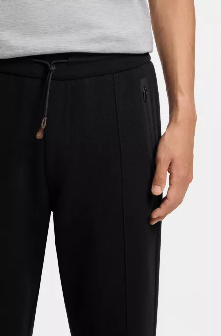 Regular-fit tracksuit bottoms in a cotton blend