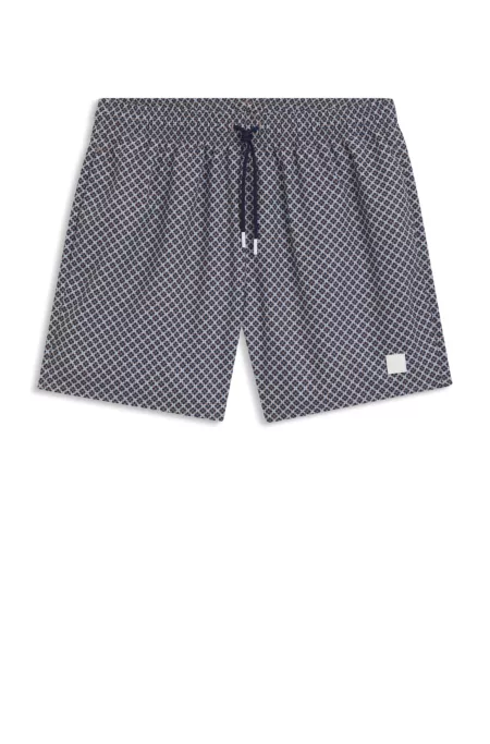 Printed swim shorts with logo badge
