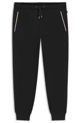 Cotton-terry tracksuit bottoms with signature stripes, Black