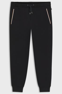 Cotton-terry tracksuit bottoms with signature stripes, Black