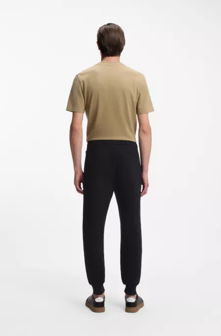 Cotton-terry tracksuit bottoms with signature stripes