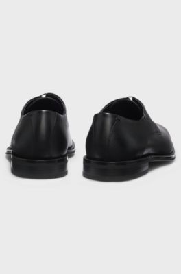 Derby shoes in smooth and textured leather, Black