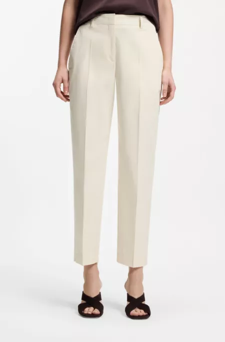 Tapered-fit cropped trousers in stretch cotton