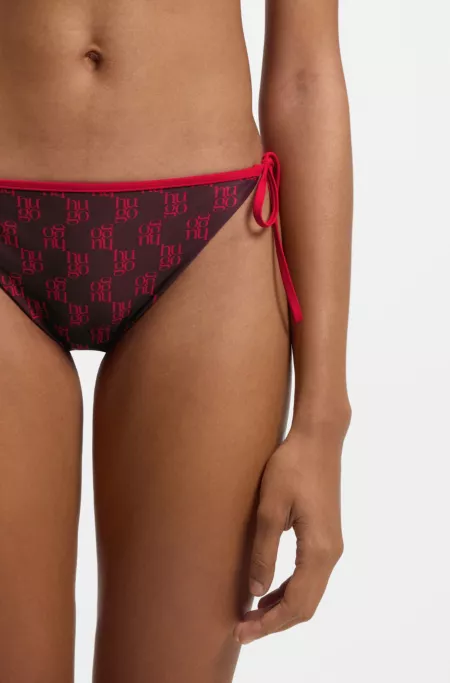 Bas de bikini avec imprimé de logos empilés