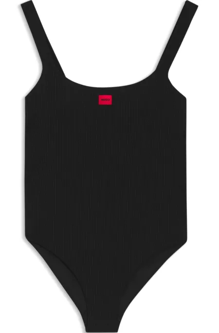 Ribbed swimsuit with red logo label
