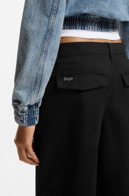 Pantaloni relaxed fit in twill di cotone elasticizzato, Nero