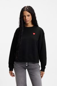 Sweater van katoenen badstof met hartlogo voor alle genders, Zwart