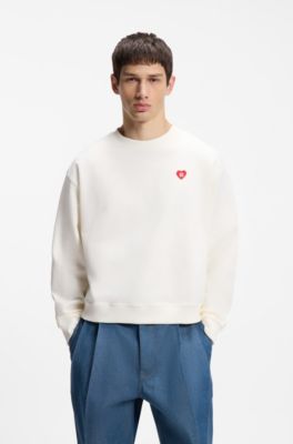 Sweater van katoenen badstof met hartlogo voor alle genders, Wit