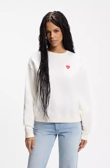 Sudadera unisex en felpa de algodón con logo de corazón