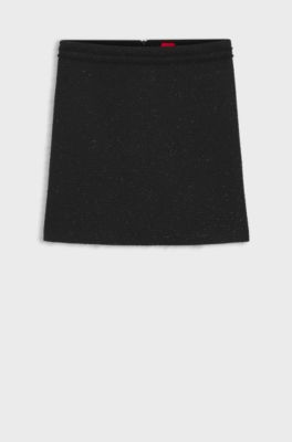 Jupe courte en maille bouclette brillante avec finition bande orn&eacute;e d&rsquo;une cha&icirc;ne, Noir