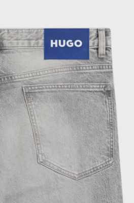 Jeans slim fit in denim grigio strappato, Grigio chiaro