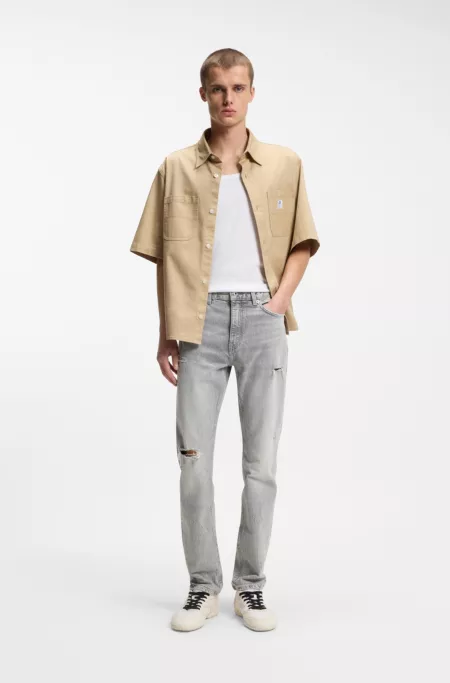 Slim-fit jeans in distressed grey denim