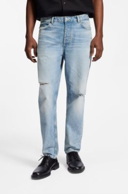 Jeans dal fit affusolato in denim strappato blu chiaro, Celeste