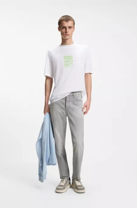 Jeans tapered fit en denim gris