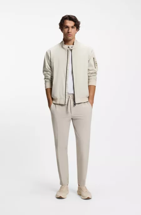 Water-repellent blouson jacket with double piping