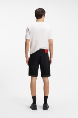 Tapered-fit shorts in black stretch denim, Black