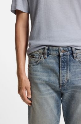 Blauwe jeans van stonewashed Japans denim, Lichtblauw