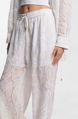 Relaxed-fit trousers with embroidered flowers, Natural
