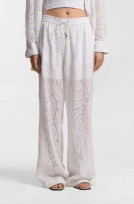 Relaxed-fit trousers with embroidered flowers, Natural
