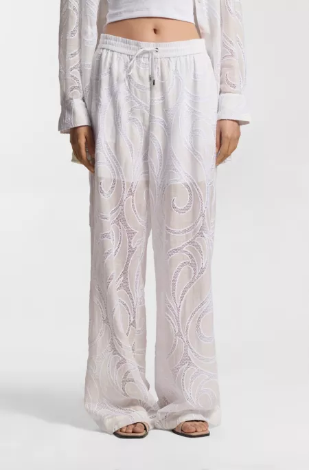 Relaxed-fit trousers with embroidered flowers