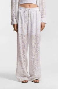 Relaxed-fit trousers with embroidered flowers, White