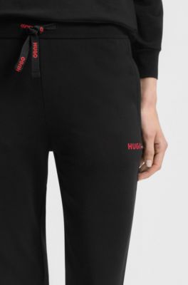 Cotton-blend tracksuit bottoms with logo details, Black