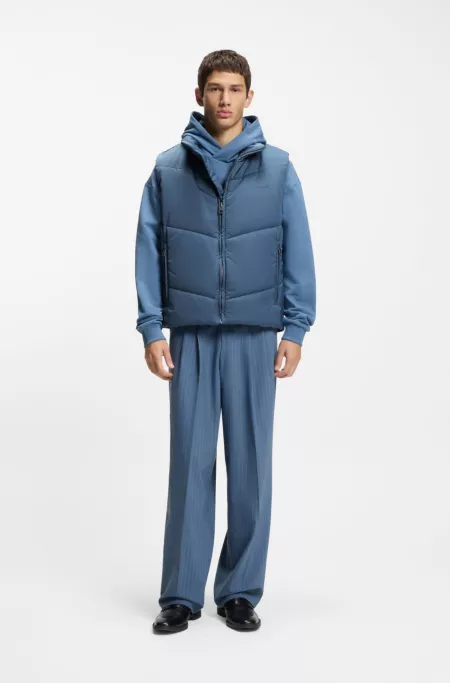 Water-repellent gilet with tonal logo