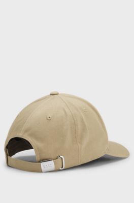 Keps av bomullstwill med broderad logga , Beige