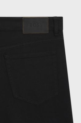 Year of the Horse Jean Tapered en denim noir &agrave; motif laser, Noir