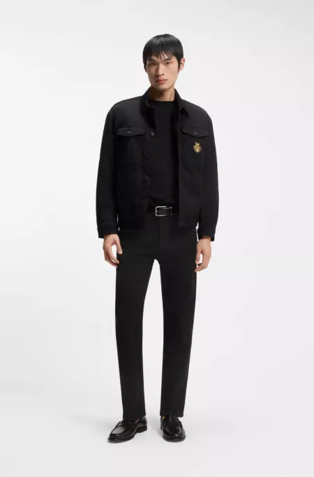 Tapered-fit jeans in laser-patterned black denim