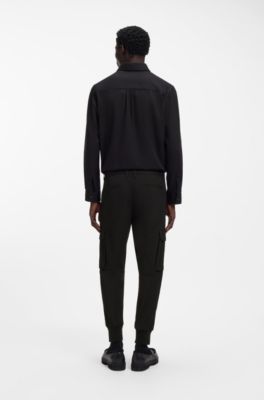 Pantalones slim fit con bolsillos estilo cargo, Negro