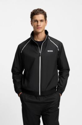 Active water-repellent two-piece tracksuit with zip hems, Black