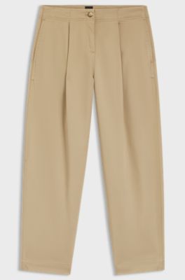 Pantalones chinos loose fit en sarga de algod&oacute;n el&aacute;stico, Beige