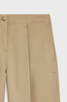 Pantalones chinos loose fit en sarga de algod&oacute;n el&aacute;stico, Beige