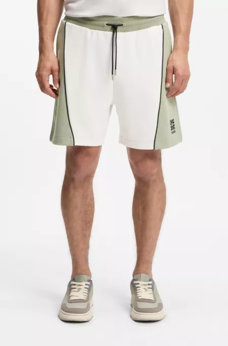Cotton-blend shorts with embroidered logo artwork