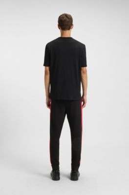 T-shirt in jersey di cotone a righe con logo, Nero