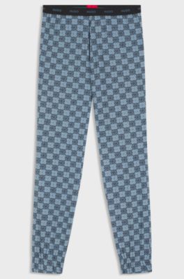 Stretch-cotton pyjama bottoms with stacked-logo print, Dark Blue
