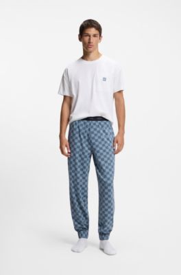 Stretch-cotton pyjama bottoms with stacked-logo print, Dark Blue