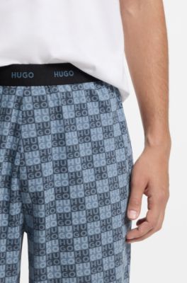 Stretch-cotton pyjama bottoms with stacked-logo print, Dark Blue