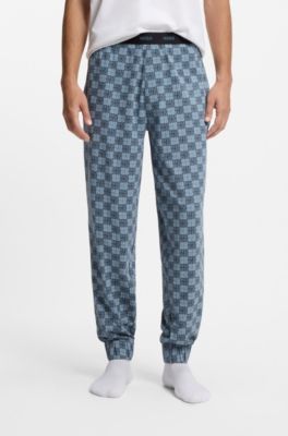 Stretch-cotton pyjama bottoms with stacked-logo print, Dark Blue