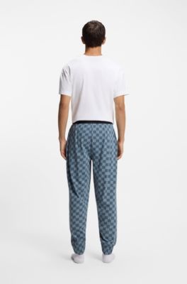 Stretch-cotton pyjama bottoms with stacked-logo print, Dark Blue