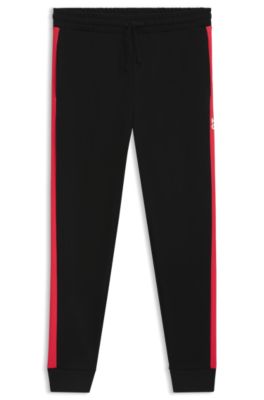 Cotton-terry tracksuit bottoms with contrast side stripes, Black