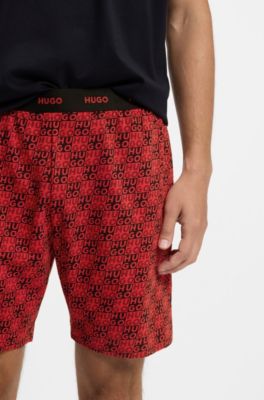 Pigiama in cotone elasticizzato con loghi scomposti, Nero / Rosso