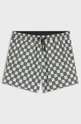 Quick-dry swim shorts with stacked-logo check print, Green